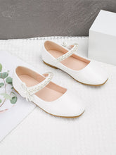 Chaussures en cuir à semelle souple blanches avec boucle perle
