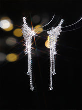 Boucles d'oreilles à pampilles en strass scintillants