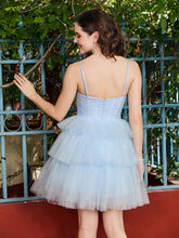 Robe courte trapèze en tulle à volants et dos nu Bleu Ciel