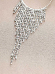 Boucles d'oreilles à franges exagérées avec des diamants d'eau