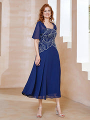 Robe à Encolure Carrée en Mousseline Longueur de Mollet avec Perles Bleu Marine Clair