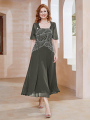 Robe à Encolure Carrée en Mousseline Longueur de Mollet avec Perles Gris Acier