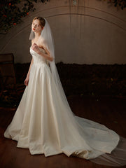 Voiles de cathédrale en tulle à bord coupé